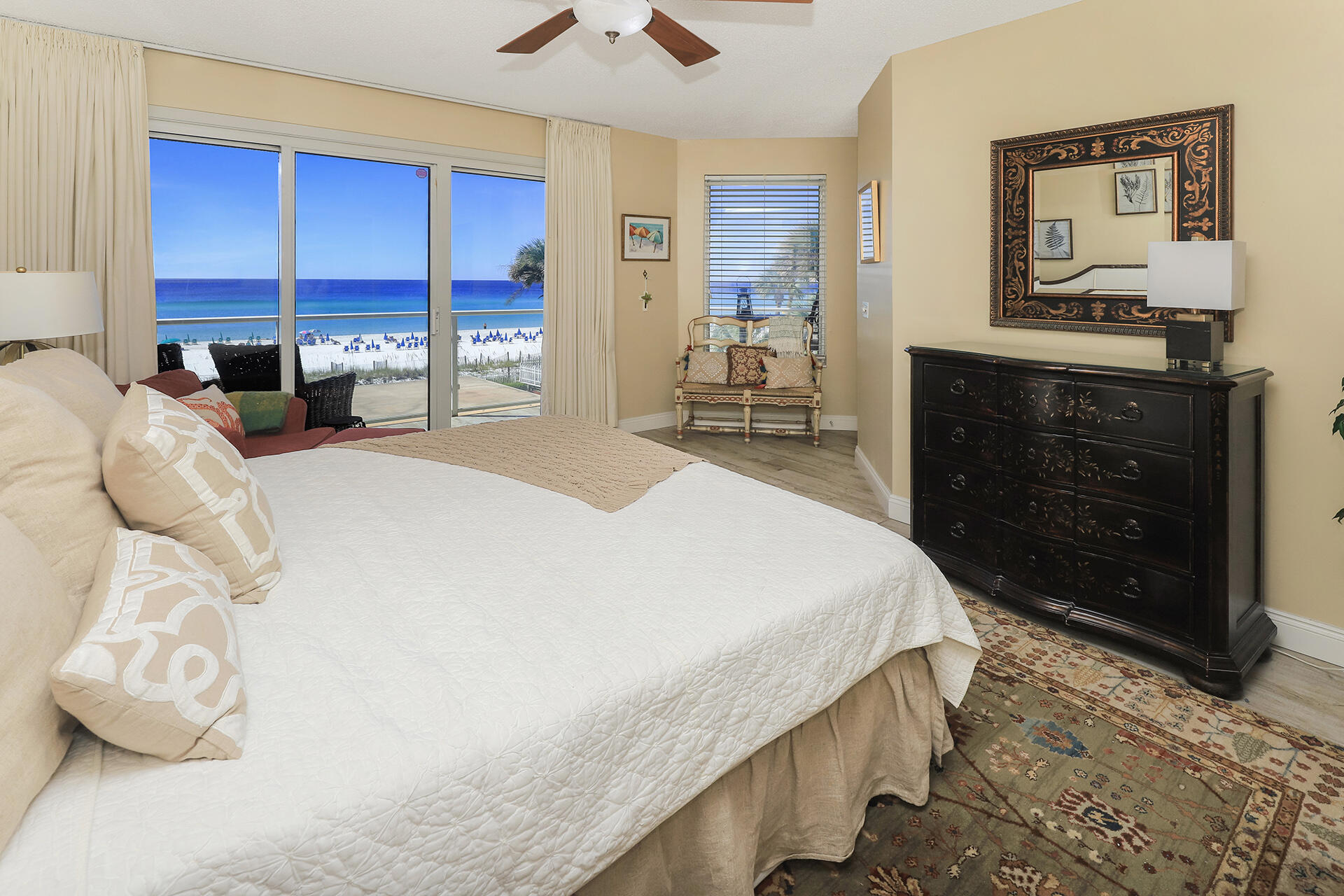 RENTAL MACHINE! This Sterling Sands unit features 180 degrees of gulf views from the west facing wrap around balcony. There are 2 Master suites and kitchens to this unit, perfect for renting separately or all together. The 3rd bedroom has a lock off capability and private balcony that also has a view of the shimmering Gulf of Mexico. Large living space with open floor plan, spacious baths with steam sauna. Walk right out to the beach and enjoy gulf views year round with the heated pool and beach service. This is a low density and very well maintained property. The rental history is excellent on this unit as there is a high repeat clientele. Building recently updated; new paint and finishes. Unit also comes with one covered garage parking spot. List of upgrades available.