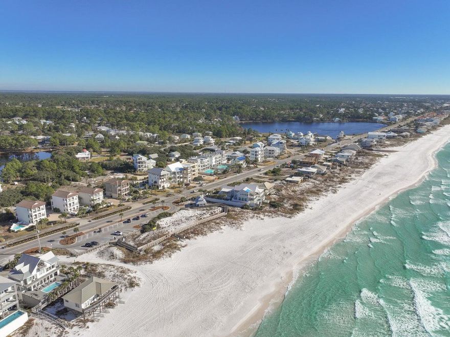 Only 1 mile from Gulf Place and Beach, this charming ALL ONE LEVEL 3 BR 2 Bath home built in 2016 on .62 acre lot with a fenced backyard and a 2-car+golf cart garage! NO HOA so it can be a vacation rental, second home or primary residence, close to golf course and boat ramp. With 2 open porches and 1 screened porch, it offers over 3200 sq. ft. of TOTAL living space! From the charming front porch, enter the spacious living area with vaulted ceilings and an open floor plan, kitchen, dining, making it easy for entertaining and continue the party on your screened porch that overlooks the private backyard with firepit. The kitchen offers stainless steel appliances, open shelving, an island/breakfast bar with a farm sink. Backyard design with Pool, Firepit, Renderings and survey in Documents. There is plenty of storage in the 2 car + golf cart garage with a TESLA Charging station, workbench and wall-mounted organization system for all your paddleboards. There is an outdoor shower located right outside the garage. From the open living area, double doors lead to the primary king-size suite with a new $4000+ custom closet system. The primary bath has an extra large shower, double vanity and separate water closet. Two spacious guest bedrooms overlook the front porch are light and bright and there is a guest bath conveniently located. The backyard is huge and is your blank canvas to install a pool, pickleball court, putting green or RV and boat parking with access through the double gate on the west side of the 116' wide lot. Located in beautiful South Walton near the beach, golf course and the Cessna boat launch! Recent improvements of over $75,000 include NEW HVAC, NEW TESLA CHARGING STATION, NEW PAINT INSIDE AND OUT, NEW SOD, NEW IRRIGATION SYSTEM, NEW GUTTERS, NEW CUSTOM CLOSET, NEW LAUNDRY ROOM CABINETS, SINK AND COUNTERTOPS! 