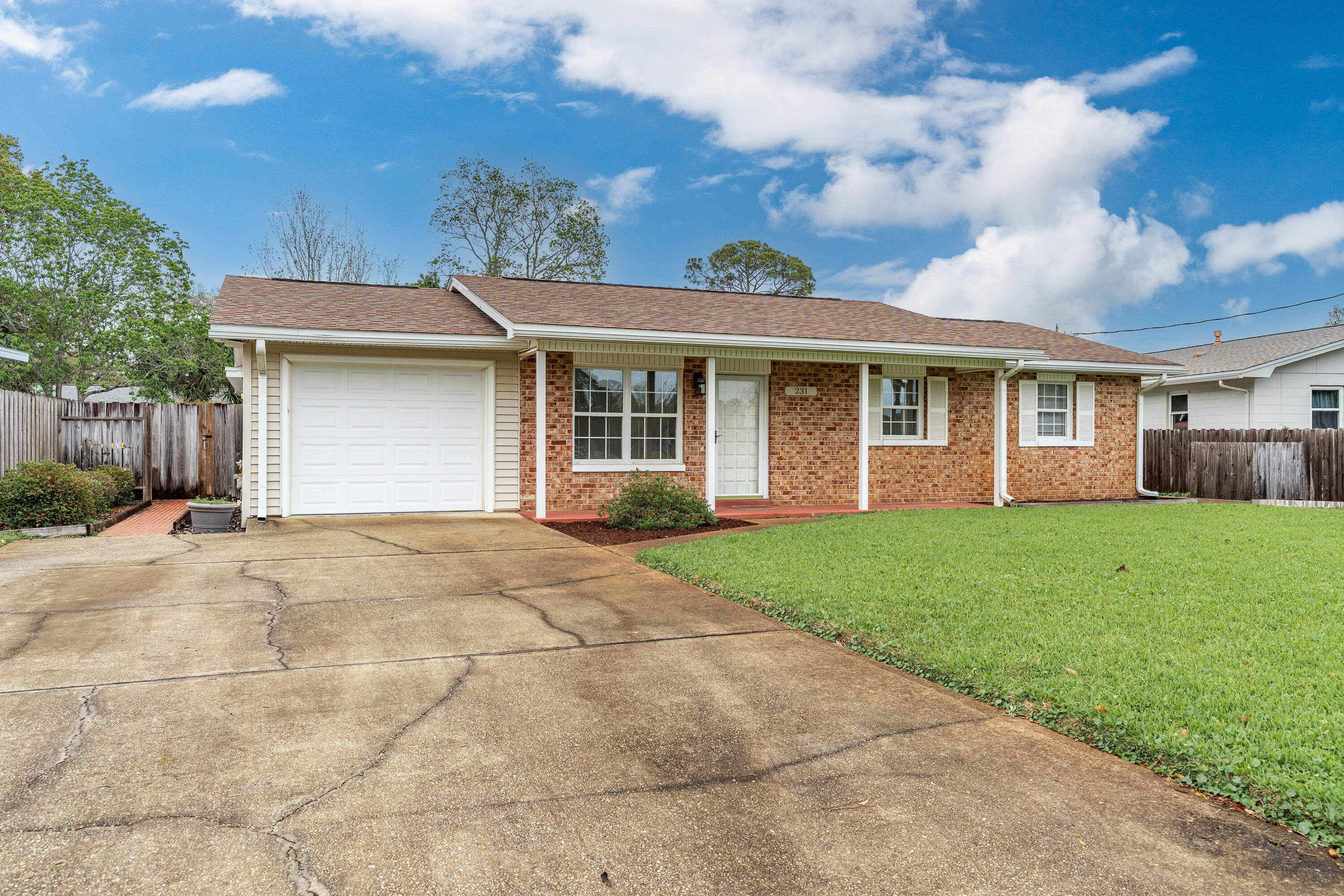 If you're looking for a cozy, well-kept home in a prime location, this property could be your next home. The home has the perfect blend of comfort, convenience, & charm. An unbeatable location. Just a short walk to a highly-rated elementary school & near Ferry Park offering a 1-mile paved walking path, tennis, disc golf, & more. The home has been meticulously maintained, ensuring that it's move-in ready for its next owners. The parquet flooring throughout living room, hallway & bedrooms in excellent condition, brings a touch of style to the interior. A modern eat-in kitchen with white cabinets, A spacious family room with abundant windows & natural light. A large workshop with storage & electricity is being offered in as is condition. AT&T Fiber available.