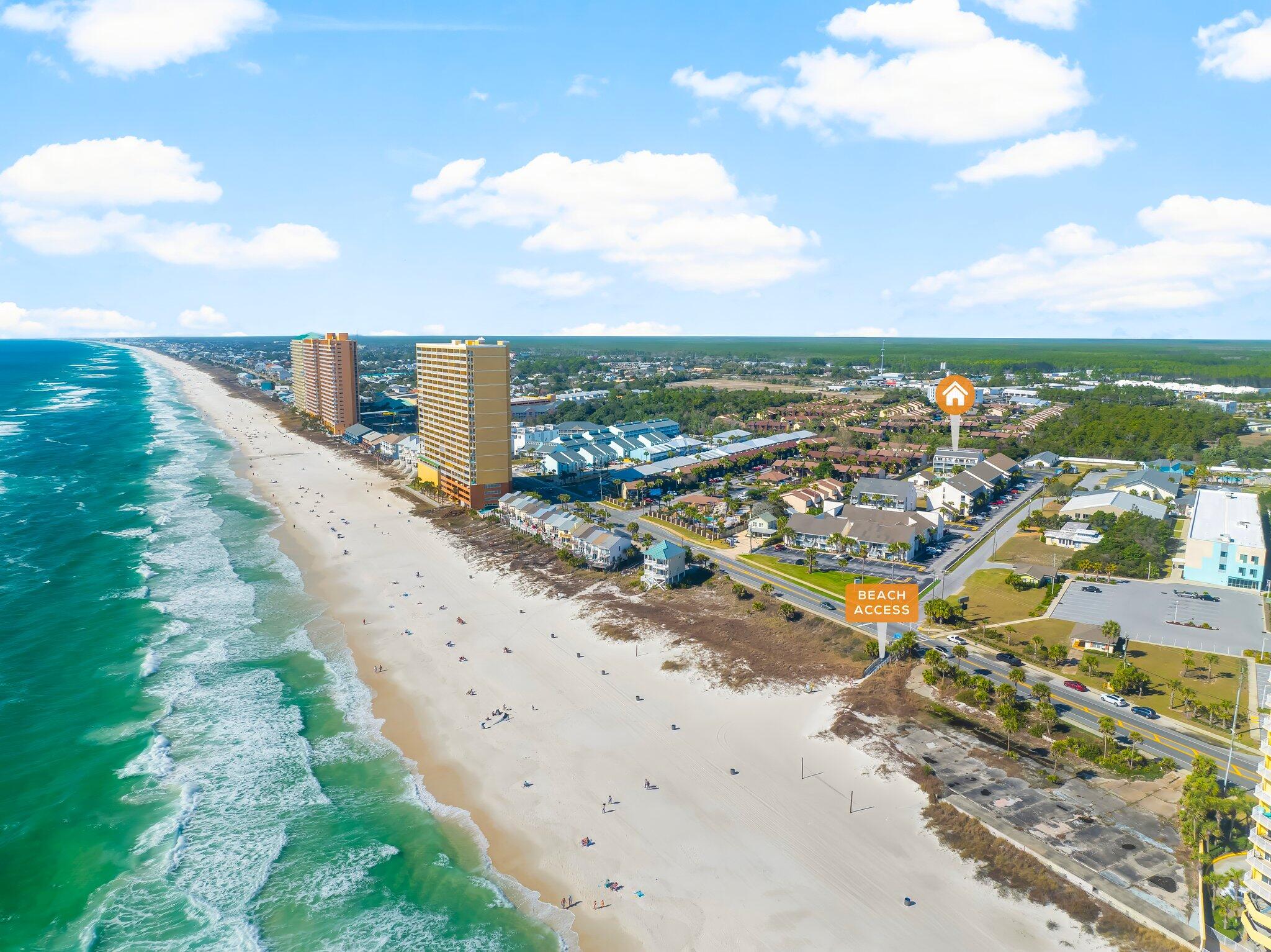 Turnkey Beachfront Retreat - Fully Furnished 1BR/1BA Condo in Panama City Beach! Welcome to your perfect coastal getaway! This modern, fully furnished recently renovated 1-bedroom, 1-bathroom condo is located on the first floor, offering easy access and a seamless indoor-outdoor living experience. the Patio faces South offering a sunny space for outdoor seating overlooking the pool. Stylish vinyl flooring throughout and large windows that flood the space with natural light, this condo is designed for both relaxation and convenience. pack up a beach chair and walk across the street to the beach where you have access to the most beautiful beached. Step outside onto your private back patio, the ideal spot to sip your morning coffee while watching the sunrise or unwind with an evening breeze.