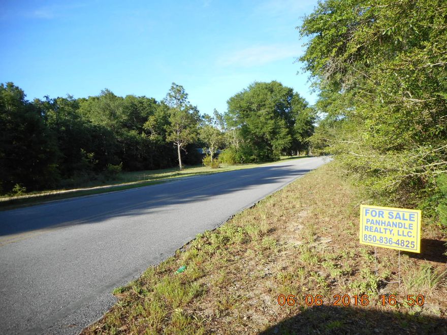 SELLER MOTIVATED! Drastic reduction to $7,500! Vacant 4.5 acre parcel of land fronting paved road in Argyle area. It is about 3 miles from Hwy 90. Portion of property is wooded and about 1.4 acres on front was once a clay pit. Argyle community water in the area. A small piece (estimated to be 1/4 acre) of the property is across the road. Unrestricted area.
