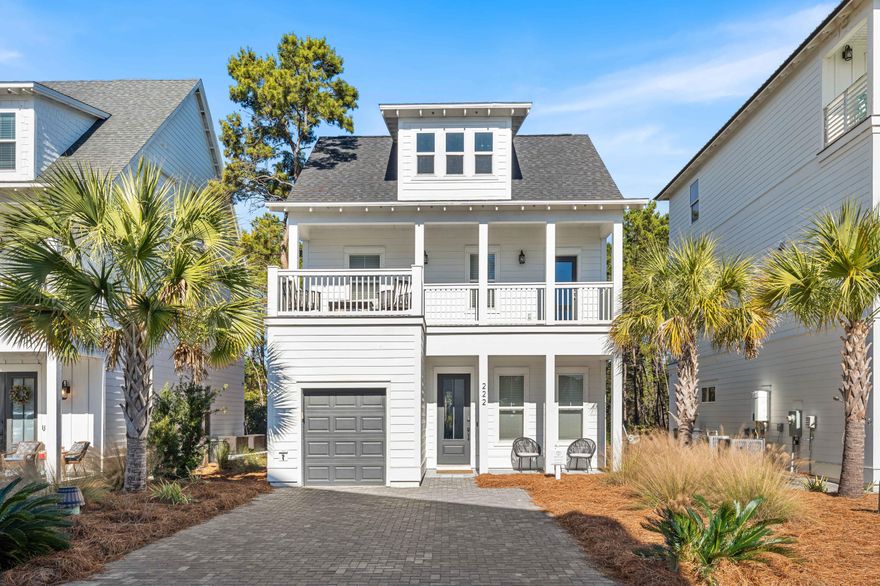 Turnkey short-term rental with a proven rental history of $70,000 per year, located in the Ivy at Inlet Beach. Built in 2022, 222 Valdare Lane offers immediate income potential in one of the most walkable and desirable areas along Scenic 30A. This property is ideal for investors, second home buyers, or those seeking a combination of personal use and strong rental performance.The home features three bedrooms, two and a half bathrooms, and a flexible layout that comfortably sleeps eight. The open-concept first floor includes a well-appointed kitchen with a gas-burner cooktop, a tile backsplash, and a seamless flow into the living and dining areas. Just off the kitchen is a backyard space ideal for BBQs, gathering around a bonfire, or relaxing after a day at the beach Upstairs, two bedrooms feature ensuite bathrooms, while the third-floor loft includes two double bunk beds, creating an ideal setup for guests or vacation renters. Added shiplap details in the stairways enhance the coastal aesthetic, and a large second-floor outdoor balcony provides an additional outdoor living space rarely found in homes of this size.

Additional features include a hardboard exterior, a tankless gas water heater, a garage for storage or a golf cart, and access to the community pool. The home is truly turnkey and rental ready.

The location is a major selling point. The property is approximately half a mile from Inlet Beach Regional Access, the largest public beach access in Inlet Beach. It is walking distance to 30Avenue with popular restaurants and shops including Amici 30A Italian Kitchen, Amigos 30A Mexican Kitchen, Canopy Road Cafe, Cuvee 30A, Idyll Hounds Proper, and Aja Elevated Asian.

The home is also located next to the new pedestrian underpass, providing easy access to Rosemary Beach, Alys Beach, and all of Scenic 30A. Camp Helen State Park is nearby, and the property offers easy access for biking or walking to the beach, dining, and entertainment.

With strong rental history, excellent walkability, and a prime Inlet Beach location, 222 Valdare Lane presents a rare opportunity to own a high-performing coastal investment in one of the most sought-after markets along 30A.
