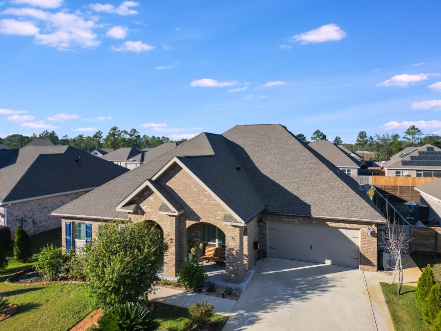 Experience Emerald Coast living in this immaculate and fully renovated single-level home in the popular Peach Creek subdivision. With tons of upgrades, including modern bathrooms, new flooring, fresh paint, electric fireplace, spacious concrete patio, permanent fire pit, extended driveway, and more, this one-owner home is truly move-in ready.  This sought after ''McKenzie'' floor plan is 3,123 sq ft and features 5 bedrooms, 3 bathrooms, and a huge open living area, study, dining room, and 2-car garage. More space than you will ever need! Outdoors is a beautiful Florida oasis with a variety of fruit trees (peach, lemon, mandarin and persimmon) and grape vines. Peach Creek has no short term rentals and is ideally located minutes from 30A beaches, schools, shopping, restaurants, Rosemary Beach, and iconic Seaside. Food trucks often frequent this friendly neighborhood, and its residents are known for their holiday decor and sense of community. Head to the beach, bike/walk the neighborhood, or grill out with friends in the fenced backyard.

The gourmet kitchen features an extra-large island for additional seating and storage, granite countertops, beautiful cabinetry and backsplash, LED lighting under cabinets and island, new glass cooktop, built-in wall oven and microwave, and designer vent hood. The breakfast area is perfect for casual meals! The spacious master suite is separated from the other bedrooms, has its own access to the covered patio, and has a renovated en suite with soaking tub, tiled walls and shower, glass shower door, double vanity, and huge walk-in closet. This well-designed floor plan has two guest bedrooms and a full bathroom located next to the study, and two additional guest bedrooms with a full bathroom off the breakfast area. There is a huge walk-in pantry and dedicated laundry room. Additional features include hardwood flooring in main living areas, crown molding, tray ceilings, and recessed lighting. Seller upgrades also include accent walls with engineered hardwood, stretch ceiling in guest bedroom, LED lighting features, and new ceiling fans and light fixtures.

Outdoors you will enjoy the convenience of a low-maintenance backyard with plenty of room to entertain guests on the covered back porch or painted concrete patio. Enjoy the convenience of a full irrigation system, gutters with rainwater pipes, outdoor breakers for generator plug-in and upgraded electrical wiring to support a sauna or pergola lighting. Exterior features also include pavers on the front porch and side yard, attic space with shelves, doorbell camera, and security system. This home is one you don't want to miss- schedule a showing today! Buyer to verify all pertinent information in listing. Sellers are offering a concession for artificial turf.