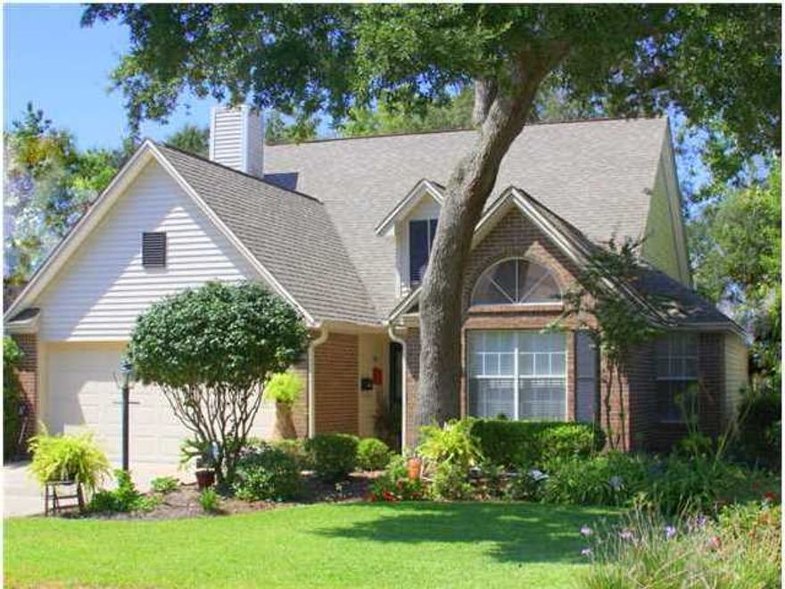 Extraordinary in charm and detail, this 1636 Sq Ft Cottage has been redesigned and updated. Large baseboards and crown were installed along with designer paint to top off the list. The foyer has been enlarged to make a warm welcoming feeling as you walk in the door. When you reach the open living room you will be close to falling in love. Walk in the kitchen and you are hooked. Custom Gourmet Kitchen has an abundance of beautiful maple cabinets, granite counter tops, stainless steel appliances, Dual Fuel 5 burner gas stove with two ovens, low profile refrigerator and a pantry. Great room has gas fireplace, vaulted ceiling and dual ceiling fans. Master Suite is tucked away for privacy. The master bath has been remodeled and has a large walk in shower. New custom Closet in Master. New Carpet