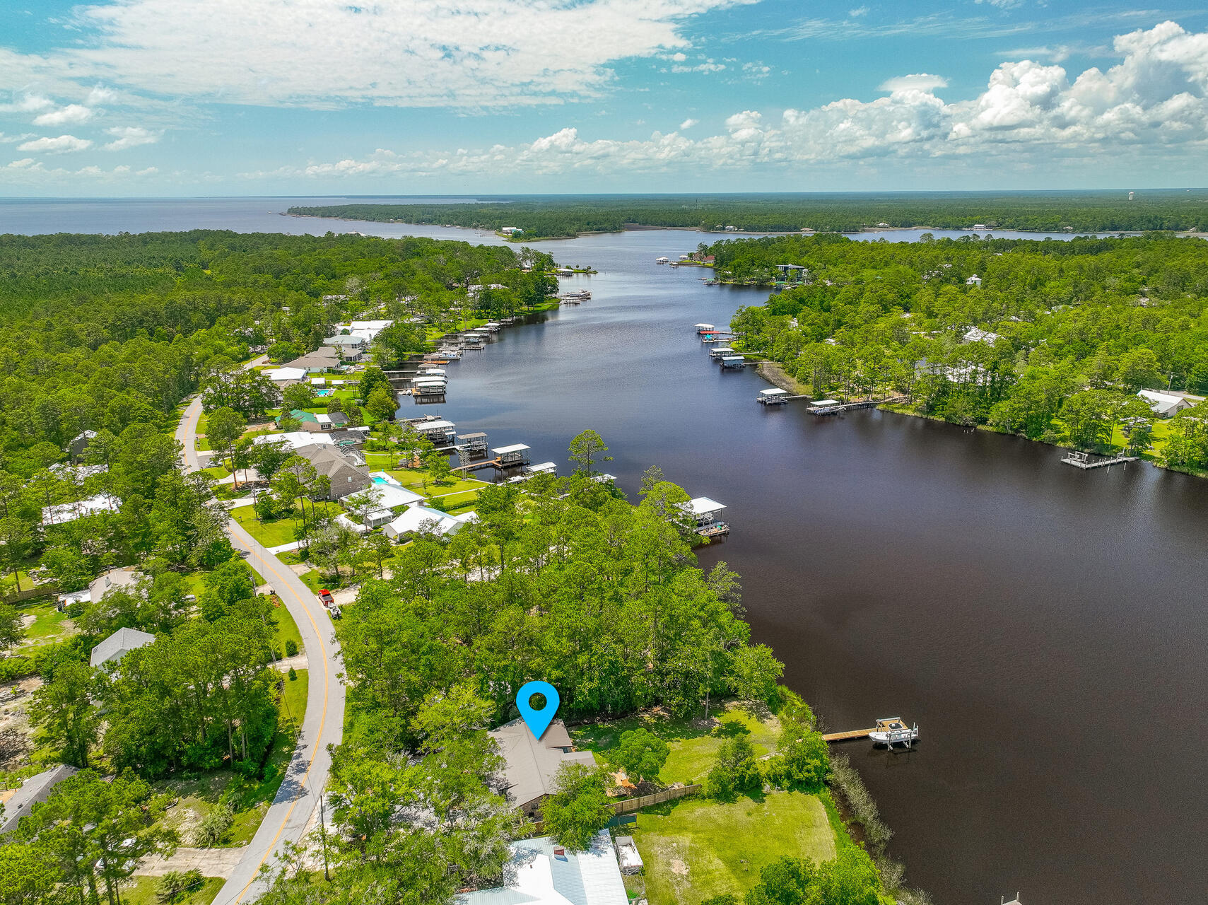 Relisted and priced to sell.  Quiet waterfront living in this recently remodeled residence on Mallet Bayou. The new boat lift and dock allow full access to Choctawhatchee Bay and the Gulf of Mexico. The home features modern elements and upscale finishes. The large back yard provides the opportunity to expand the living space, with no HOA the possibilities are endless. The bedrooms offer a quiet retreat, while the open kitchen and living areas provide a perfect space for socializing.