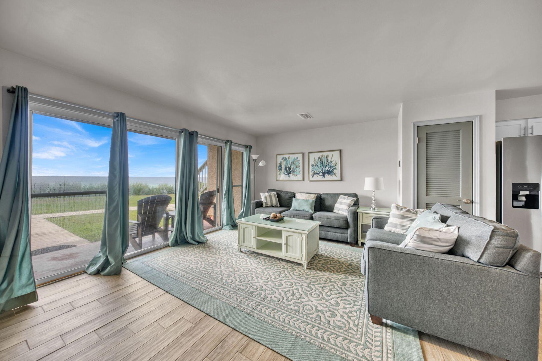 Completely remodeled with excellent rental income. This condo on the east end of 30A with desirable features including its gulf-front location, a ground-floor, one-story living, and its location in the small Blue Tide complex in Seacrest Beach. This one-bed, one-bath impeccably maintained retreat with built-in bunkbeds can comfortably sleep up to four, just steps away from Blue Tide's private beach access. This condo has been fully renovated including new drywall, baseboards, trim and ceramic hardwood tile in addition to fresh paint throughout. The kitchen has been upgraded with new cabinetry, white granite countertops, sink and fixtures and new stainless steel appliances. In the living room, you'll find a new 55-inch smart TV and a new sofa. Other recent additions include a