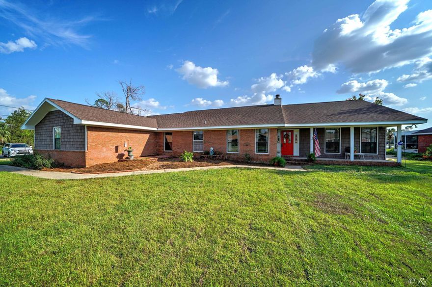 Large Waterfront home in Lynn Haven! This home has so much to offer for the price: deep water access that leads to the gulf, corner lot, extra large 3 car garage, split floorplan, 4 FULL bedrooms (all nice sized), formal dining room/sitting area (bookshelves convey), eat in kitchen, fireplace, large living area overlooking the Bayou and large master suite with walk in closet. The bonus room is heated and cooled and makes for a nice place to spend your evenings overlooking the sunset and relaxing. The custom made wood bar conveys with the home. The bonus room is perfect for large gatherings as well. The kitchen has an island & plenty of cabinet space. Boardwalk and wet slip in place. This home is perfect for someone that needs lots of space and water access! Shelving in the garage conveys.