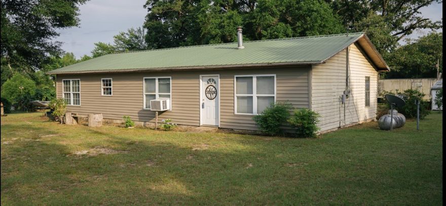 This home is the Country location you have been looking for!  4 bedrooms 1.5 bath, needs someone with a little TLC to make it their own. The home is sitting on an acre. Come take a look at all the possibilities of this place!