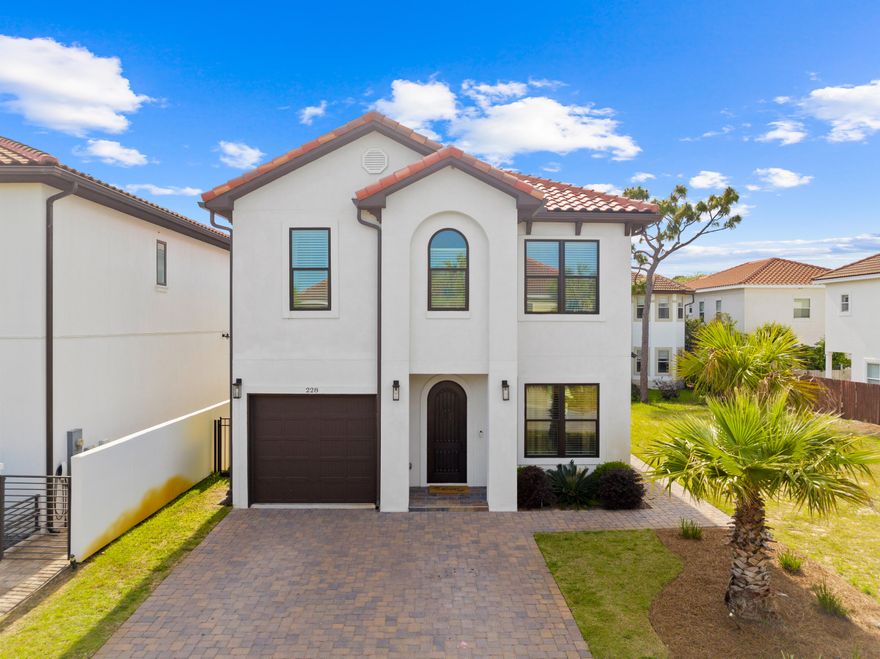 SELLER OFFERING $10,000 CREDIT TOWARD BUYER'S CLOSING COSTS! Elegance at its finest with this Custom built home in the beautiful gated community of Calusa Bay! This safe and quiet mediterranean style neighborhood is minutes from the white sand beachs, shops, and restaurants. You'll fall in love with this two story home featuring 4 bedrooms and 4.5 bathrooms. Get swept away by the high-end kitchen. It's a culinary masterpiece, featuring top-of-the-line appliances including an industrial-sized Electrolux fridge, double dishwashers, granite countertops, plenty of cabinet storage space, two sinks, a pot filler, and a Fisher & Paykel stove. Enjoy the open floor plan and coveted features which include 10ft ceilings with crown molding, tile floors on the first floor and European Oak floors upstairs, electric stone fireplace, many windows for natural light throughout, and laundry room upstairs. The backyard is an entertainer's dream, complete with a convenient outdoor kitchen and firepit table, perfect for hosting. Walk upstairs to a spacious loft, great for a kids playroom or designated office space. Enjoy a book or some coffee on the private deck off the primary suite. Step into the primary suite bathroom, where opulence meets functionality. Adorned with granite countertops, a double vanity, a large tub, and a spacious tile shower equipped with multiple shower heads, this bathroom is a true oasis of relaxation and indulgence. The meticulously designed custom closet offers ample storage space and exudes sophistication, providing a stylish and organized sanctuary for your wardrobe. On those hot summer days, walk a few minutes to the neighborhood pool to cool off and swim! Short term rentals are not allowed. Don't miss out on the opportunity to this one of a kind home in Destin!