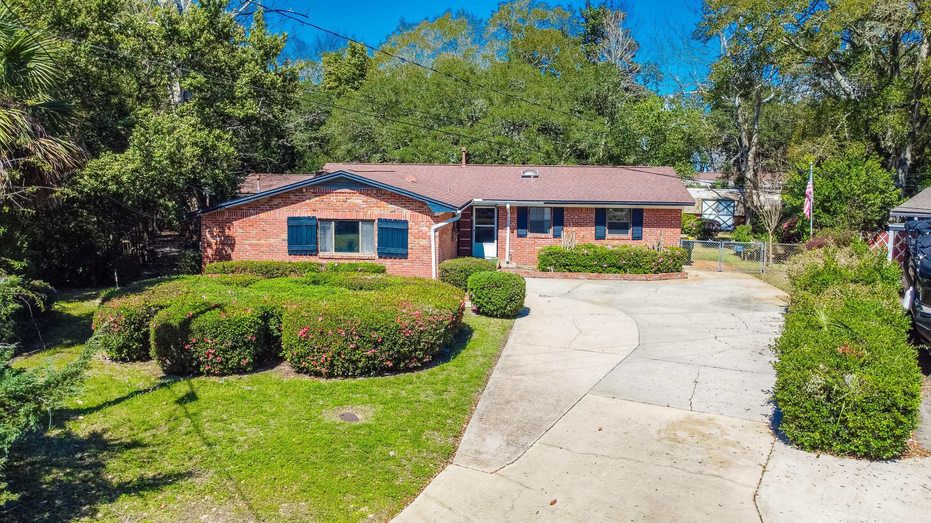 Home with beautiful lot on cul-de-sac in Ft Walton Beach! The property is being sold AS-IS. Though the property should qualify for most loans, it could use a complete cosmetic renovation. The home showcases a large, fenced backyard with beautiful landscaping and a yard building. Enjoy the natural beauty from several different viewpoints the home offers including a covered patio, an enclosed porch and a spacious Florida room detailed with stained-glass windows. The property also includes two separate living areas and three bedrooms opposite of the living area. The property is located within a few miles of Downtown Ft Walton Beach & Okaloosa Island and is within 6.5 miles of Eglin AFB.