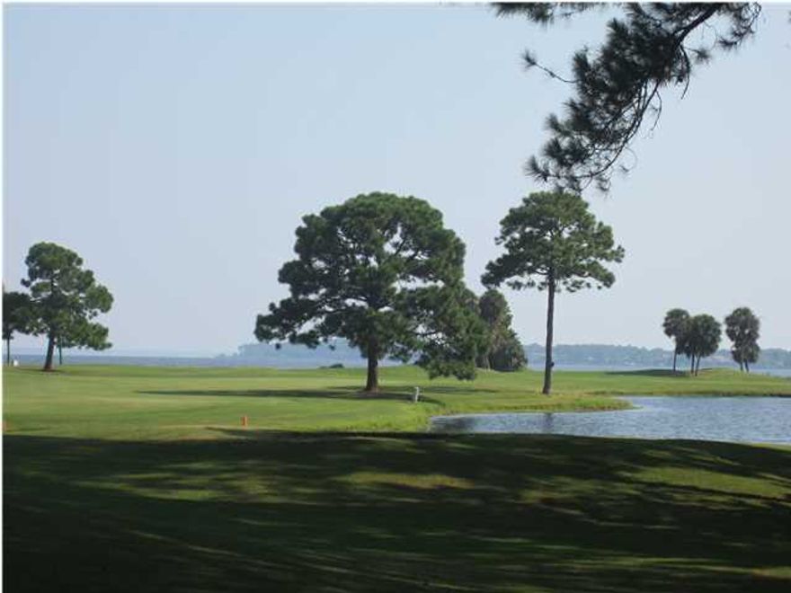 PRICE REDUCTION!!!! Seller wants an offer!!! Beautiful 2 bedroom, 2.5 bath townhome in the very sought out neighborhood of Fairways in Sandestin. Two story foyer greets you at the entrance with a view of the Links Golf Course in the background. Elegant furnishings throughout the home. Plantation shutters, granite countertops, tile and many more updated features. Oversized back deck has plenty of seating for guests and boasts an awesome view of the bay as well as the golf course. This home would make a wonderful full-time residence as well as a vacation getaway or rental. Move-in ready...just bring your golf clubs, bathing suits and toothbrush and you will be all set to enjoy your new home!!!!