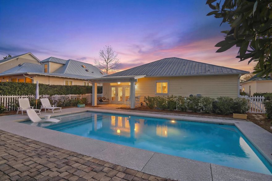 Experience coastal charm in this Crystal Lake home within Sandestin Golf & Beach Resort. Situated on a private .24-acre retreat features a heated saltwater pool (2022), fenced yard, enlarged garage, and classic white picket fence. Wood floors highlight the open concept living, dining, and kitchen filled with natural light, perfect for entertaining. French doors lead to a covered patio, sundeck and expansive pool area for effortless indoor-outdoor living. The main level includes a spacious primary suite, guest bedroom or office, and laundry. Upstairs offers two guest rooms each with access to the full-length covered porch.  A full bath completes the upper level.  Newer appliances, HVAC, heat pump, gas range, and tankless water heater provide peace of mind. in this move-in ready home.