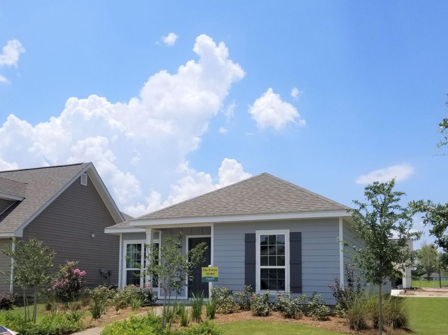 MODEL HOME FOR SALE! HURRY WONT LAST LONG. Home includes washer, dryer, side by side refrigerator, blinds, all drapes, stainless steel appliances and side garage door.This home is 4 sides Hardie board and a corner lot. Great Location !!$ 5,000 Closing cost incentive provided using builders preferred lender.The Porter plan has 3 bedrooms, 2 bathrooms and a two car garage. Very Open Floorplan. Large Island in kitchen. Separate Tub and 5ft fiberglass Shower in Master Bath.Monthly HOA fees of $ 295 INCLUDE: Over 150 Cable channels, Access to all pools, 24hour gym, Clubhouse, Movie Theatre, Tennis and Basketball Court, Playground, Bay Club with Fishing Pier. HOA in Schooner Landing also INCLUDES a full landscaping program. Every Yard is Maintained- Cut, fertilized, mulched,