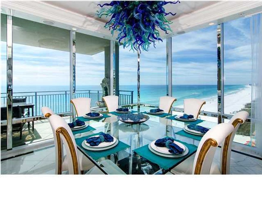 Located in the heart of Destin, but off the beaten path is Signature Beach. Southern California style, Southern charm, and a good helping of Caribbean-colored seas separate this one-hundred percent custom condo from anything else on the Emerald Coast. Light from the ten-foot high floor-to-ceiling windows floods every inch of living space. As you walk through the front door, the emerald green waters of the Gulf of Mexico beckon you closer to the view spanning all sixty-six beachfront feet of this secure, luxury hideaway. Contemporary architecture, lavish finishes, and designer furnishings fill this large and luxurious four bedroom condo. Your guests will enjoy their own private bathroom no matter in which one of the four bedrooms they happen to sleep. Smart-home system provides