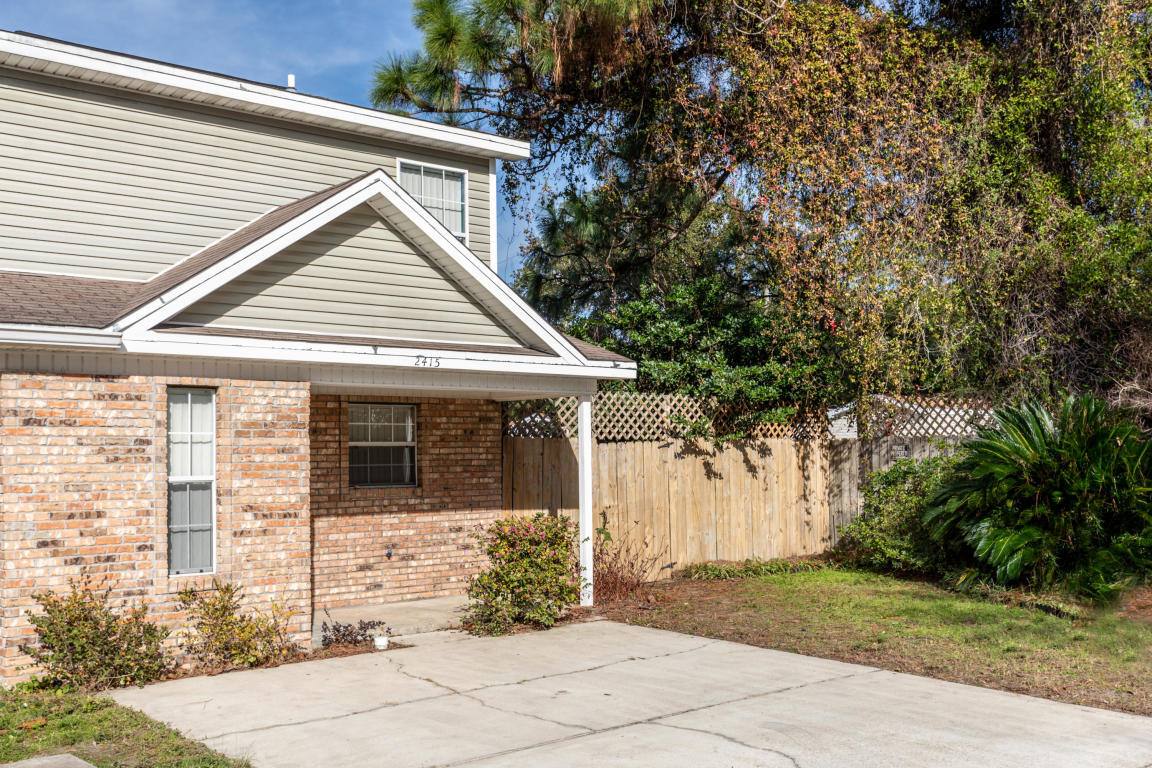 Great end unit townhouse in Ocean City area of Fort Walton Beach. Two bedrooms, one and a half baths in this 1250 sq ft beauty with a fully fenced rear and side yard, not to mention a two car driveway for the vehicles. Spacious kitchen looks right into the Dining and Living rooms with a conveniently located half bath. Upstairs you'll find two spacious bedrooms and a full bathroom as well.