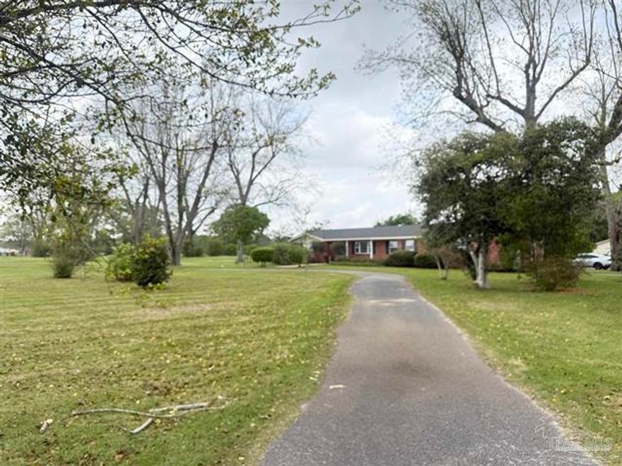 Escape to the tranquility of country living with this charming 2,466 sq ft, 3-bedroom, 2-bath home nestled on 9 sprawling acres with a pole barn and sq ft separate workshop. Enjoy the bounty from the fruit and pecan trees, complete with a private well for irrigation in the garden area. Inside, you'll find hardwood floors, a gas range, fireplace, and inviting formal living and dining rooms perfect for entertaining. Take in breathtaking, expansive views of the serene countryside from your own slice of paradise. This is the perfect retreat for those seeking space, comfort, and the simple joys of rural life. Roof Oct. 22, HVAC 2025, plus washer and dryer convey.