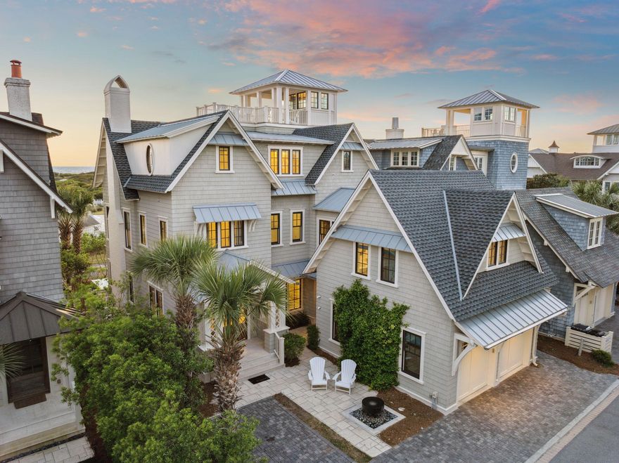 Perched gracefully within the coveted gates of Watersound Beach, this architectural gem redefines casual elegance along the Gulf Coast. Thoughtfully designed by TS Adams and masterfully built by Gulf View Construction, this four-story residence seamlessly blends refined craftsmanship with the laid-back luxury of coastal life. Positioned on a premium lot with unobstructed views of rolling dunes and shimmering Gulf waters, the home invites you in with accordion-style doors that dissolve the boundaries between indoor comfort and outdoor splendor. Multiple open-air terraces and covered decks span every level -- including a fourth-floor tower--creating the perfect backdrop for sunset cocktails, stargazing soirees, or sun-drenched afternoons. At the heart of the home, a gourmet chef's kitchen dazzles with lustrous granite counters, shiplap accents, a Dacor 6-burner gas range, and a Sub-Zero refrigerator  tailored for both culinary ambition and relaxed entertaining. Five uniquely styled bedroom suites are thoughtfully arranged across three floors, each offering proximity to the home's inviting gathering spaces. Every level features its own lounge, wet bar, half bath, laundry, and ice maker  designed with both convenience and comfort in mind.

Step outside into your own private resort. A heated infinity-edge pool anchors the outdoor living area, while a tranquil coastal bed swing invites quiet reflection. Three wood-burning fireplaces  two outdoors and one inside  set the tone for cozy gatherings year-round. Multiple lounging nooks, outdoor televisions, and a screened first-floor porch create versatile spaces for relaxation and entertainment. The lush garden gate opens to a boardwalk that winds through protected dunes, leading to the sugar-white sands of the Gulf. Along the way, enjoy access to the neighborhood's pool and dining amenities, just moments from your door.

Meticulous ownership is evident throughout, with a long list of premium upgrades and thoughtful care. In 2024 alone, the home saw a new composite/metal roof, new shake siding, fresh exterior paint, full exterior waterproofing, and a complete third-floor interior renovation. While the third-floor HVAC system is entirely new, the existing outdoor units were retained  ensuring transparency while showcasing the investment in comfort. In 2023, two tankless water heaters were installed, the exterior fencing was replaced, and the screened porch was added. In 2025, the pool heater motherboard and lithium golf cart batteries were updated to maintain peak performance.

Beyond upgrades, consistent maintenance speaks to a standard of excellence. Monthly pest control has been in place since construction. Doors and windows receive annual care from EF San Juan. Appliances have been proactively serviced by Mr. Appliance since 2020, and the elevator is professionally inspected by Panhandle Elevator each year. A fully integrated Control4 smart home system, installed and maintained by WattSound, offers modern convenience with intuitive control.

Wrapped in a classic Nantucket-style exterior with mildew-resistant paint, stone pavers, and low-maintenance native landscaping, this home was built for enduring beauty and ease. The elevator services all three floors, ensuring accessibility for every generation. Never rented and impeccably maintained, this coastal retreat is more than a home  it's a legacy, ready to host cherished memories and timeless moments along Florida's Emerald Coast.

Reach out to us for cost to own figures + rental projections. 