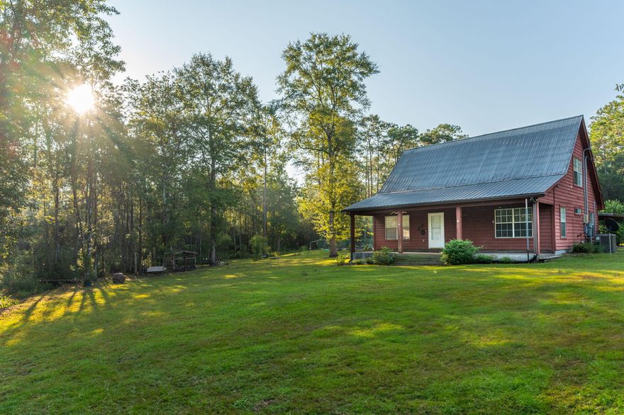 SELLERS TO OFFER A $2500 CLOSING COST CREDIT. Situated on a 1.74-acre lot, this 3/2+bonus room home is a nature lover's dream. A peaceful creek flows through the property, adding to the tranquility of the surroundings. The outdoor amenities are equally impressive, w/ barn&inground pool for outdoor fun. Privacy is paramount in this secluded location, offering breathtaking views of the surrounding nature and wildlife. As you step inside, an open floor plan welcomes you, creating a spacious & inviting atmosphere. The master suite is a sanctuary, featuring an updated bathroom & large walk-in closet. Two additional bedrooms on the main floor w/an additional loft area tucked away upstairs, perfect for guests or a 4th bedroom. This home also comes w/ solar panels, which is a savings for yo