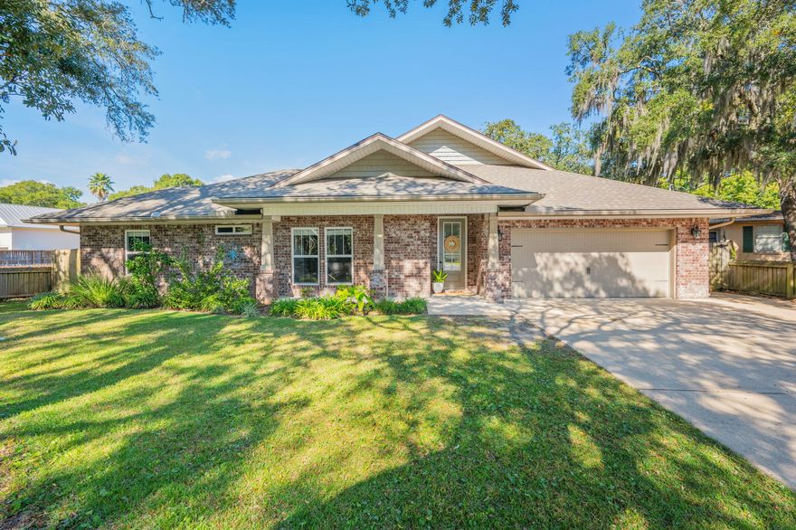Discover the best of Downtown Fort Walton Beach in this beautifully built 2017 brick home, ideally located within walking distance to shops, restaurants, pickleball courts, parks, and the public boat launch on the stunning Choctawhatchee Bay.This spacious 4-bedroom, 3-bath split-floorplan home offers comfort, functionality, and high-end finishes throughout. The large master suite features double vanities, a walk-in shower, and a luxurious jacuzzi tub.The spectacular chef's kitchen is equipped with top-of-the-line appliances, including a gas stove and an oversized side-by-side refrigerator and freezer, all complemented by granite countertops and a generous breakfast bar. A separate wet bar with beverage center, sink, and storage makes entertaining effortless. Additional conveniences include an indoor laundry room with front-loading washer and dryer, a 2-car garage with large attic space, and extra driveway parking suitable for extra vehicles, a boat, or trailerperfect with the boat ramp just across the street.

Outside, enjoy a fully fenced backyard complete with a paver patio and firepit. Lawn service is included, offering ease of maintenance and more time to enjoy the coastal lifestyle.

This home offers the perfect blend of location, quality, and comfortminutes from the beach and surrounded by the best of Fort Walton Beach living.
