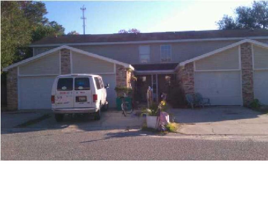 This is a short sale. Perfect for an investor who is looking to get the entire building, 2400, is also available for sale. All of the units have an attached one car garage.Back yard, great for grilling. Inside laundry, wood laminate floors down stairs, tile bath, kitchen floors downstairs. Very large master bedroom and bath, plus walk in closet. Close to employment, medical facilities, Eglin, and Hurlburt field.