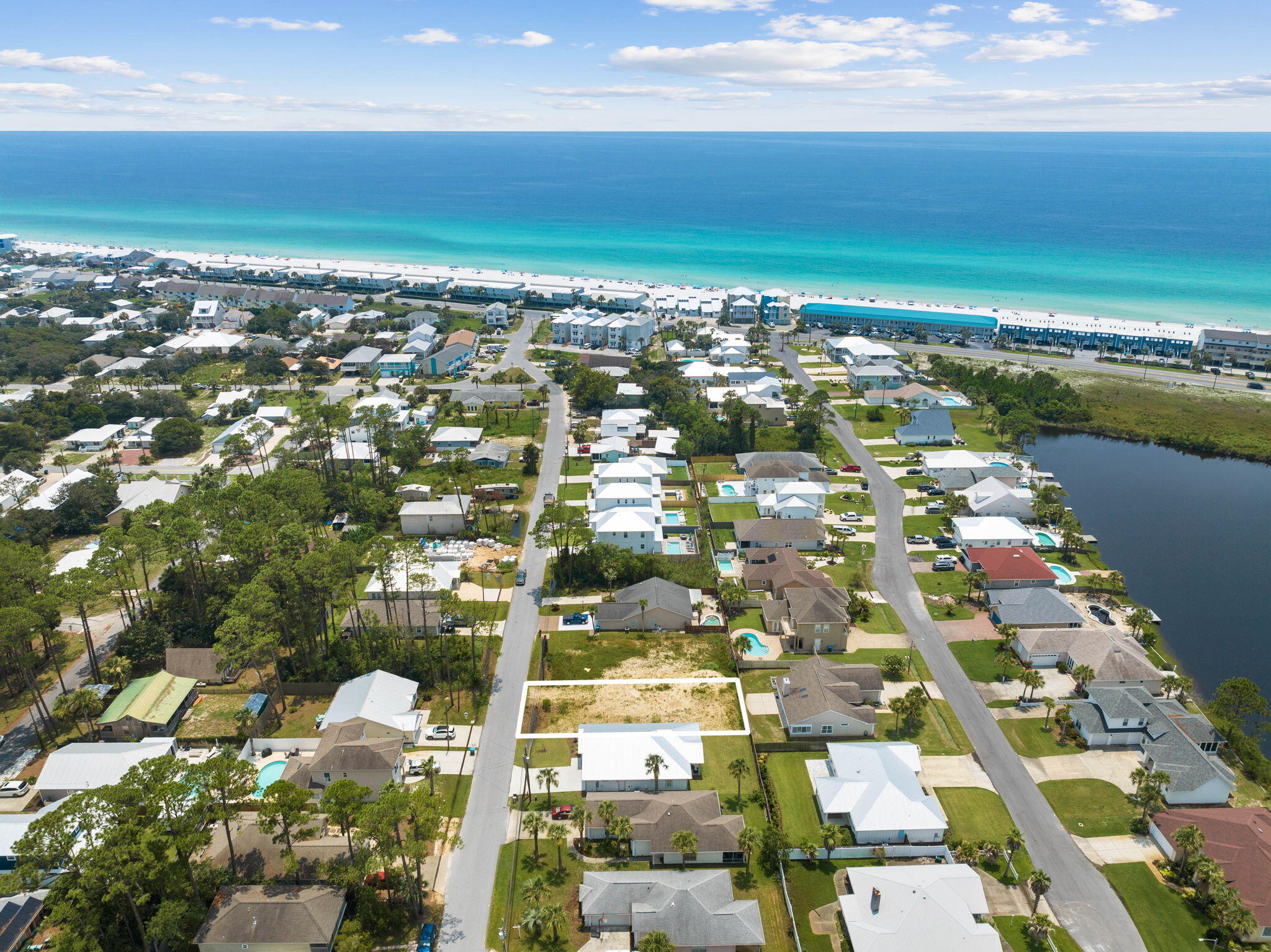 NO HOA!! SHORT TERM RENTALS ARE ALLOWED!! This .13 lot is located on the furthest end of Panama City Beach in Inlet Beach Heights. This lot is about 3 miles to Highway 30A. Are you looking to build your dream home or an investor looking to build a new rental house, then this is it!! It's also only 0.2 miles to the public beach access!!