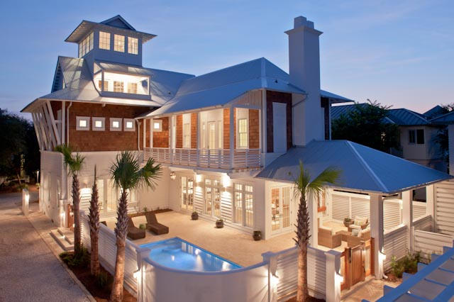 Unique opportunity to own a custom designed, 4,330 sq. ft., beautifully furnished 5 bedroom, 5 1/2 bath courtyard style tower home on a large lot in Rosemary Beach. Entry to this magnificent architectural gem is marked by a four-story elegant masonry tower that acts as a vista termination to one of the urban pocket parks at Rosemary Beach. As you enter the home you will immediately sense the meticulous attention to detail in the handmade over sized custom mahogany front door and the wide plank white oak hardwood floors. Illuminated by a custom designed suspended chandelier, this exquisite and beautifully designed 2-1/2 story entry foyer with slated wood walls features a unique