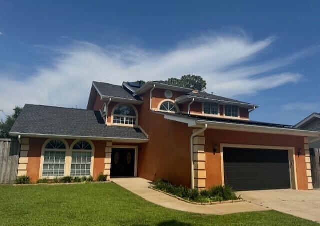 VA ASSUMABLE LOAN available to qualified buyers at 2.5%, now with an option to finance the equity gap! BRAND NEW ROOF (April 2025) AND fully PAID OFF SOLAR. Beautifully renovated home in a 5 home waterfront community with deeded Sound access steps away and only 6 miles to Hurlburt Field. Grand double entry doors lead to a big, bright Great Room with a wet bar & French doors to the back deck. The Chefs' Kitchen, features granite counters, a Bosch induction cooktop, wall oven, stainless appliances and pantry. The Breakfast bar is adjacent to the Family room with a cozy gas fireplace and the heated and cooled Florida Room. Elegant stairs lead up the 2nd floor where the master suite offers water views and an updated bath with twin vessel sinks, freestanding tub and tiled walk-in shower. The 2 upstairs guest bedrooms also share a fabulous, updated guest bathroom with a subway tile walk in shower. Don't forget the large heated and cooled 384 sf Florida room, whole home gutters and the large, fully fenced backyard with 8ft privacy fences; plus irrigation, a shed, firepit, a fruit bearing Pear tree and double gate access to park your RV, Boat or other toys! Other special interior mentions include new paint, new light fixtures and ceiling fans, a water filtration system, oversized 2 car garage, and smart home accessories, such as Nest Thermostats, video doorbell, front door keypad, security system and more! Located only 6 miles/10 minutes from both Hurlburt Field and beautiful Navarre Beach, plus only 1 mile from the new Publix, this exceptional home is ready and waiting for it's new owners. Home is located in Flood Zone X and flood insurance, whilst highly recommended, is not required!