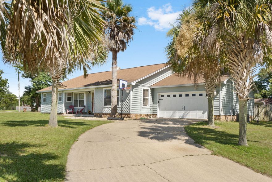 INCREDIBLE! **$20K OFF ORIGINAL PRICE In addition, seller to contribute $10K TOWARDS CLOSING COSTS, PREPAIDS OR BUY DOWN OF BUYER'S MORTGAGE POINTS!!!!!! ACT NOW OR MISS OUT! Fantastic corner lot home on East Navarre's quiet Weeping Willow Lane; perfectly situated on a desirable HIGH & DRY flood zone X lot, 12 miles from Hurlburt Field, 4 1/2 miles from the beach and 1 1/2 miles from the high school. NEW ROOF to be installed prior to closing, A/C NEW 2019, WATER HEATER NEW 2018. This 3 bed, 2 bath move in ready home sports a large flex room and a MASIVE WALK-IN SHOWER and TWO CAR GARAGE. You'll have plenty of room in the FENCED IN BACK YARD for a pool, pets and other outdoor activities. Out building conveys in AS/IS condition.