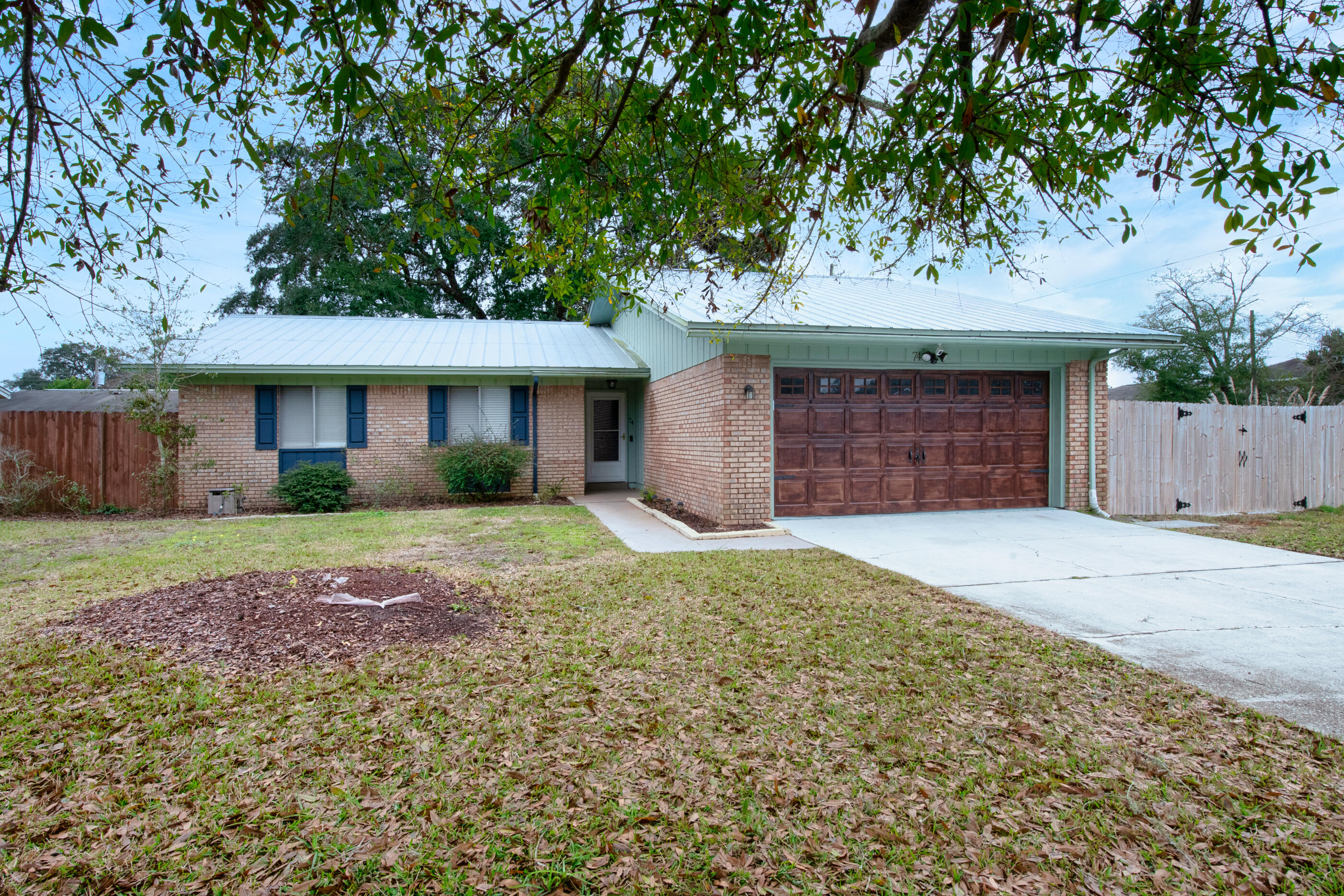 Minutes to Eglin AFB this corner lot home has been completely renovated! Featuring a 2 car garage, 2020 water heater, 2021 breaker box, outdoor shower near hot tub, upgraded bathrooms, newer light fixtures, updated cabinetry in kitchen along with newer countertops, pantry, island, backsplash, shelving, and stainless-steel appliances. The living room boasts a floor to ceiling stone inset fireplace. The primary bedroom offers walk in closet as well as on suite bathroom with tiled shower. The backyard features a gazebo area perfect for entertaining, with grape vines, blueberry bushes, blackberry bush, avocado tree, orange tree, fig tree, rosemary and basil plants! The yard is fully fenced! Schedule a showing today!