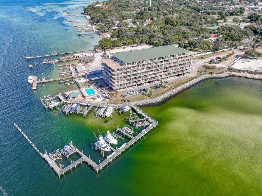 NEW LISTING! BOAT SLIP! Enjoy fabulous views from this condominium residence at Sides Moreno located on the Choctawhatchee Bay just as it meets East Pass and Destin Harbor! Enjoy tracking the dolphins and the fishermen as they head into the Gulf, view Crab Island from your balcony, salute the fireworks at Harborwalk Village from your living room, or catch the sunset over the bay from the community dock. SHORT-TERM rentals are not allowed as a the rental restrictions permit a minimum rental period of (30) days. The 3-bedroom, 3-bath residence has been recently remodeled and features an open living room/dining room/kitchen with amazing vistas from almost every room! The newly remodeled kitchen offers new kitchen appliances, quartz counter-tops, and breathtaking views! Access the amazing....
