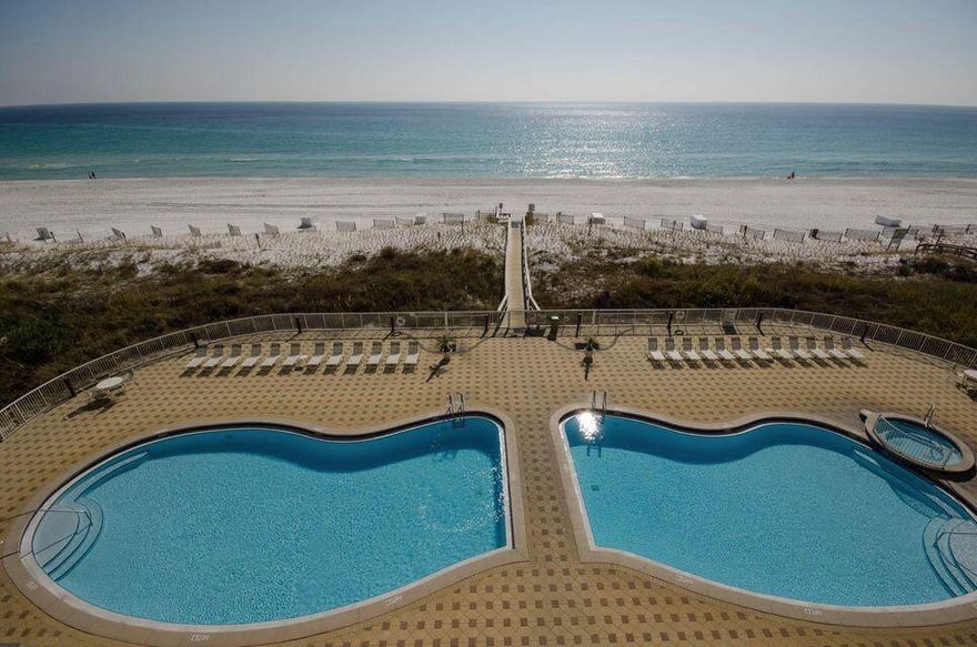 Contingency contract so taking back up offers. TOP FLOOR UNIT WITH SPACIOUS BALCONY AND GORGEOUS GULF VIEWS.  2 BR WITH BUNKROOM. PROECT AMENITIES INCLUDE: 230 FT OF BEACH, GULF FRONT EXERCISE ROOM, PRIVATE GATED PARKING, 2 GULFSIDE POOLS (1 HEATED), BAR-B-Q AREA, LARGE DECK AREA AND SPA. UNIT FEATURES INCLUDE: 9 FT CEILINGS, 8 FT WIDE BALCONIES, UPGRADED WITH TILE THROUGHOUT MAIN LIVING AREAS, GRANITE COUNTERTOPS IN KITCHEN, GE APPLIANCES AND CEILING FANS.