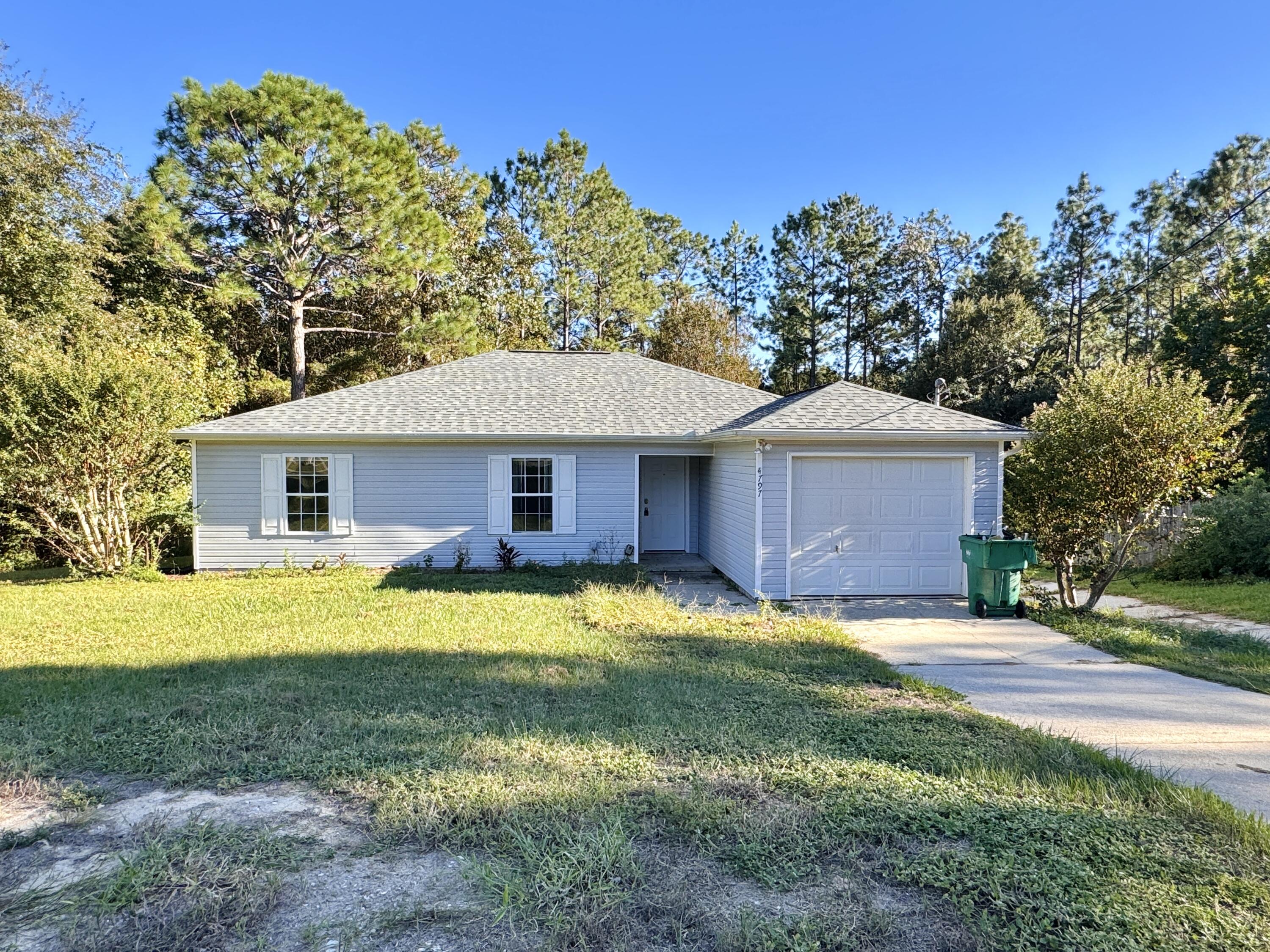 Available 11/4/24! Welcome to this beautiful 3 bedroom/2 bath home located in South Crestview! Cute house with single car garage and back deck perfect for entertaining! All bedrooms have LVP flooring and both bathrooms are wonderfully designed with wood panel accent walls. Galley kitchen and dining area illuminates with natural lighting. House sits in a cul-de-sac great for extra privacy and back yard has a line of trees for even more privacy! Easy access to main city roads, shopping, and bases. Pets allowed with owner approval and non-refundable $400 pet fee. Laundry hookups onsite. Perfect home for the price and location.  No inside smoking or vaping. Stonebridge HOA. Don't hesitate to apply for this affordable gem today! Applications are done online on rentgoodlife.com