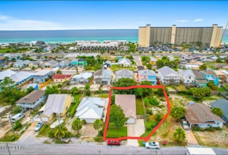 Adorable little beach home on 1 & 1/2 Lots with in walking distance of the beach! This home is 2 story with Master on 1st floor, The home has 3 beds 2 baths and a loft. It has a gas fireplace and a Horizon Florida room off the back of the house. Yard has lots of mature trees and established grass. This is a great Home for someone looking in this area. Dont miss it