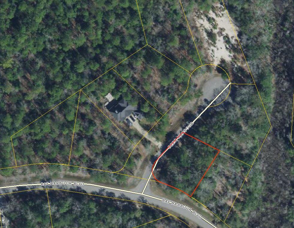 .313 acre CORNER LOT on Cult-de-sac entrance in beautiful bay front community, is just waiting for a new home to be built on it. Bay Harbour Subdivision has 116 home sites - 79 interior and 37 bay front, with over 175 acres of natural preserve, this community has walking trails, tennis courts, a community dock and beautifully landscaped ponds and gardens! There is even secured boat and RV storage. Tucked away on Bay Loop in Freeport, Florida - you are 30 minutes to the beach and 15 minutes to Interstate 10.