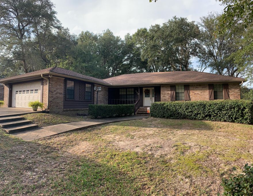 NEW ROOF!!! Do not miss out on this beautiful home in Countryview Estates. Very spacious 3 bedroom home with open floor plan concept that sits on almost half an acre. 2 car garage that leads into the pantry and laundry area with tile floors. Open kitchen with granite countertops and tile backsplash with a window over the kitchen sink. Laminate wood floors in all the bedrooms. Tile floors in kitchen and baths. Beautiful fireplace in the center of the living room for those cold nights. You also have a florida room that was added with tongue n groove cypress that is heated and cooled. Back yard you will find very spacious for the fur babies, and you have your own covered patio for grilling. To top it off you are located on a corner lot with plenty of parking space.