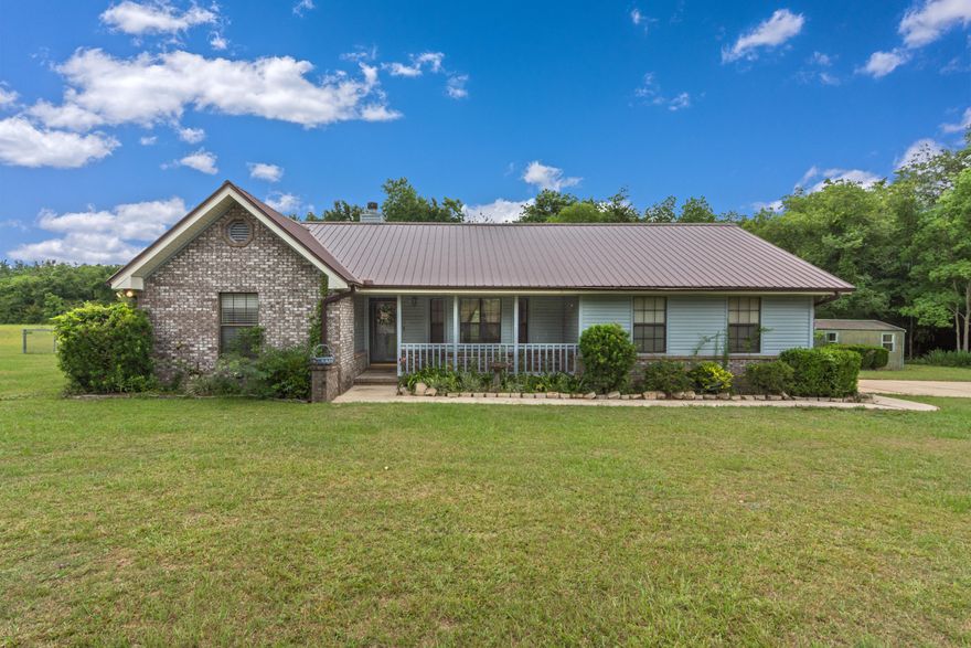 Single Family home on just shy of 2 acres. Wood and gas burning stone fire place in the living room. Gas stove in kitchen with newer stainless appliances. Split floor plan. Enjoy country living but in close proximity to grocery shoppings, schools, bank, restaurants and post office . Large deck off back porch, area fenced in back yard but property line much further out. Small green house to convey.