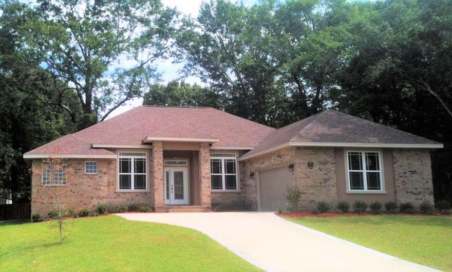 Parade of Homes 2016 winner! Juniper Creek is a beautiful S Crestview community with underground utilities, street lights, side walks, and one of a kind custom homes. You cant get much closer to Eglin AFB or Duke Field. This custom home has a court yard entry over-sized garage to add to the unique curb appeal. Large mature oak trees provide plenty of shade in the back yard. This open floor plan is just what you have been looking for. The high ceilings, crown molding and attention to detail show the quality craftsmanship that this home was built with. All wood cabinetry in kitchen with granite counters and stainless appliances are complimented by this open design. The master bedroom is huge and the spa like bathroom is sure to please. The fourth bedroom can also be used as an study.