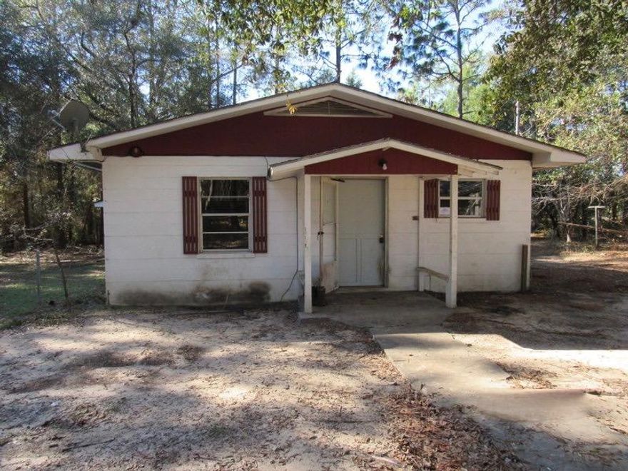 This Fannie May Homepath REO was built in 1981 and rests on 4.37 acres. All block construction, this property is oozing with potential. 3 bedrooms and 1 baths, this 1300 sf home is close enough to the country for the woodsman and equally to the city for those who like to be closer to town. On site there is an additional building that can be used for workspace, mother in law quarters or reconverted back to parking. A must visit to see the potential. Call today!