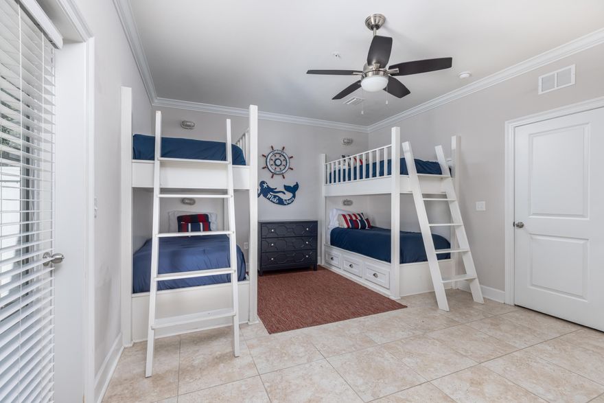 Great opportunity to own beautiful new investment property projected to gross over $90K annually! Built in 2017, centrally located in Miramar Beach, less than a 3 minute walk to the beach and built to maximize return on investment! This 4 bedroom unit has porcelain tile on the first floor and a large bedroom with built-in bunks, tons of storage, and bathroom. The second and third floors have real oak hardwood flooring and balconies throughout with Trex decking and aluminum rails. The kitchen boasts AristaCraft soft-close cabinets, granite counter tops, stainless steel Frigidaire Gallery appliances, and a large maple wood island table. This home features 9 foot ceilings, 5 -1/4'' crown molding, impact glass windows, 2 sets of washers/ dryers (1st and 3rd floor), 3 Carrier heat pump air