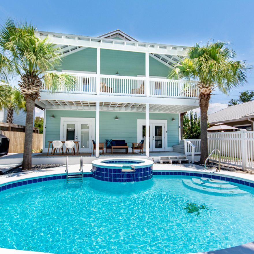 Now is the time! Buyers financing fell through! Seeking Short Term Rental Investment? Looking for an excellent 1031 Tax Exchange-- This is YOUR house! 2022 rent rolls are strong,>195k so far!The Dream Weaver is the perfect place for an amazing Destin vacation for groups up to 16 guests! With a split layout of 2 homes, a breathtaking pool & over-spill spa, plenty of outdoor space to kick back & relax.  The front home ( carriage house)_offers ground level entry with keypad check-in into the two bedroom | 1 Bath, with full kitchen. Main residence offers 3 bedrooms, 3 baths, with an incredible large upstairs game room with walk out porch. Residence is turn key and income producing. Over 230k In rental revenue for 2021