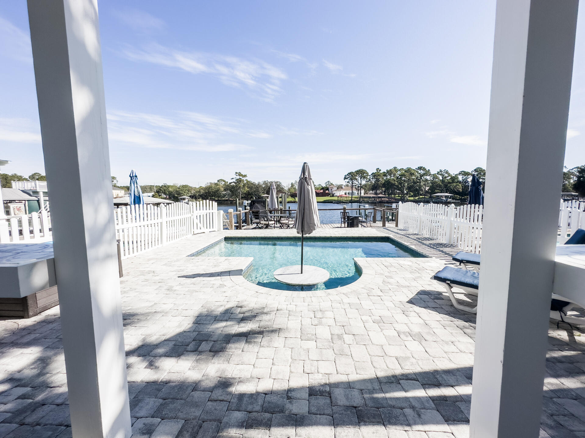Upscale waterfront home on Grand Lagoon with a view of the Gulf of Mexico. Make it your home or a vacation home. This could also be a GREAT short term rental property, this home could easily sleep 14 people and be a cash cow Watch dolphins swim in your backyard or take a short boat ride to Shell Island. Located just 2 minutes walk to the sandy beaches of the Gulf of Mexico.There deep water boat dock with full hookups. This home features the finest finishes throughout, including mahogany exterior doors hurricane resistant windows, metal roof, 10-14' ceilings, granite countertops throughout, top of the line stainless steel appliances & an elevator. One of the very few homes with your boat parked in the backyard & a view of the Gulf of Mexico from your front yard