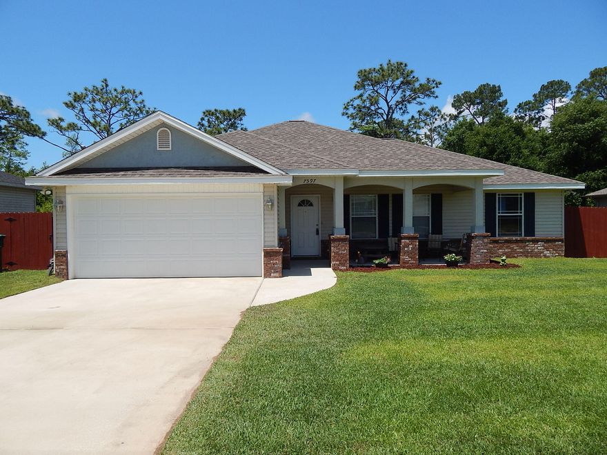 BETTER THAN NEW!!!! This Craftsman Style, 2012 built, 3 bedroom, 2 bath, 2 car garage home features low-maintenance tile floors throughout with carpet in the Bedrooms. The Kitchen is a Spacious, Open-Concept Plan with wide Granite Countertops, long Breakfast bar, Quality Wood Cabinets and a Pantry! The dining room functions as an oversized eat-in kitchen area and opens to the Living Room! The Living Room is Open and Bright with a Vaulted Ceiling and lots of wall-space for any size entertainment system. There are cultured marble counter tops in both baths. This home is a Split bedroom plan with a Large Master Bedroom with a Large Walk-in Closet. The Master Bath has a Separate Shower and Garden Tub. The Guest bedrooms are nicely sized and have fan lights.