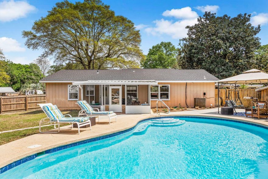 Welcome in to this charming, coastal pool home that sits on a large corner lot. Interior has been newly painted and meticulously maintained. You'll love the floor plan that positions the 4th bedroom on the opposite end of the home providing a fabulous office space. Cook dinner as you look out over the screened in porch and inviting gunite pool-perfect for entertaining! Tons of storage in this home with two master closets, large pantry and laundry room and two sheds. New roof 2023 and hurricane clips to save on insurance! Gunite and pool pump 2019. Convenient to Hurlburt or Eglin and only 10 minutes to the beach! Would make a great primary or short term rental.