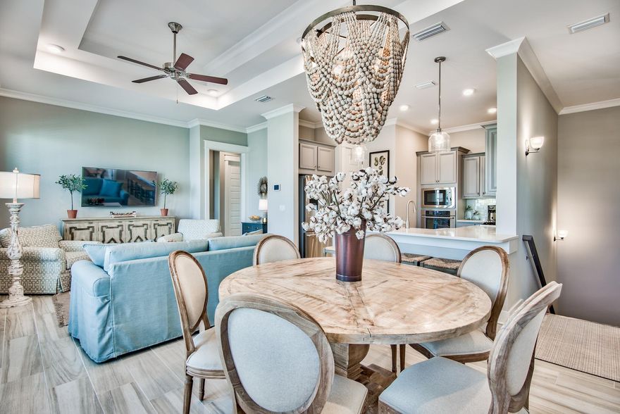 Investor alert! Not one thing is missing in this elegantly decorated coastal chic 2B/2B townhome in Prominence on 30A. Well-appointed, spacious home has more than $20K in builder upgrades including painted kitchen and bathroom cabinetry; chef's kitchen w/upgraded Electrolux stainless appliances; upgraded tile floors in living area; quartz counters in kitchen and baths and farmhouse sinks. Additional upgrades include crown moulding in living area, pottery barn furniture and linens, custom light fixture in guest bedroom and sliding doors to maximize space with two full beds and two chest of drawers. Open living and dining areas have 10' ceilings and expansive windows. Two sets of French doors lead to covered deck overlooking neighborhood.

Ideal two bedroom layout boasts king-sized master bedroom with ensuite, large walk-in closet, dual sinks, oversized shower and upgraded fixtures.

Second guest bedroom is well-appointed with two full beds, two dressers and sliding closet doors to maximize bed space. French doors lead to the balcony and tub/shower combo is located with hall access. Laundry room includes full-size washer/dryer. With resort-style amenities, convenient location across from eateries and shopping at the popular Hub and a short bike, shuttle or car ride to the beach, this coastal charmer offers the best of everything that's delightful about 30A.

This home has never been rented and makes for an ideal second home or vacation rental. Rentals for this maximized living space projected to be $42K in gross rentals. Don't miss this chance to call this elegant coastal home your next beach home.