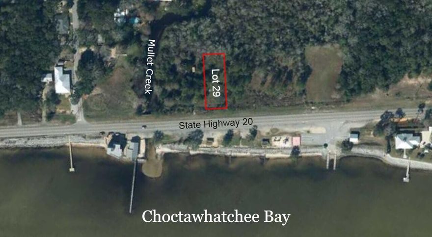 Incredible opportunity built on a beautiful Bay view Lot!! All the DEP approvals have been taken care of and everything is in place to allow for you to have forever. Choctawhatchee bay Views at a modest price. located just north of and on Highway 20 across from the boat Launch where you will be able to have your boat in the water in just a few of minutes. Click on the photos to discover the type of views you will enjoy daily. So ...don't delay and don't let this opportunity slip away!