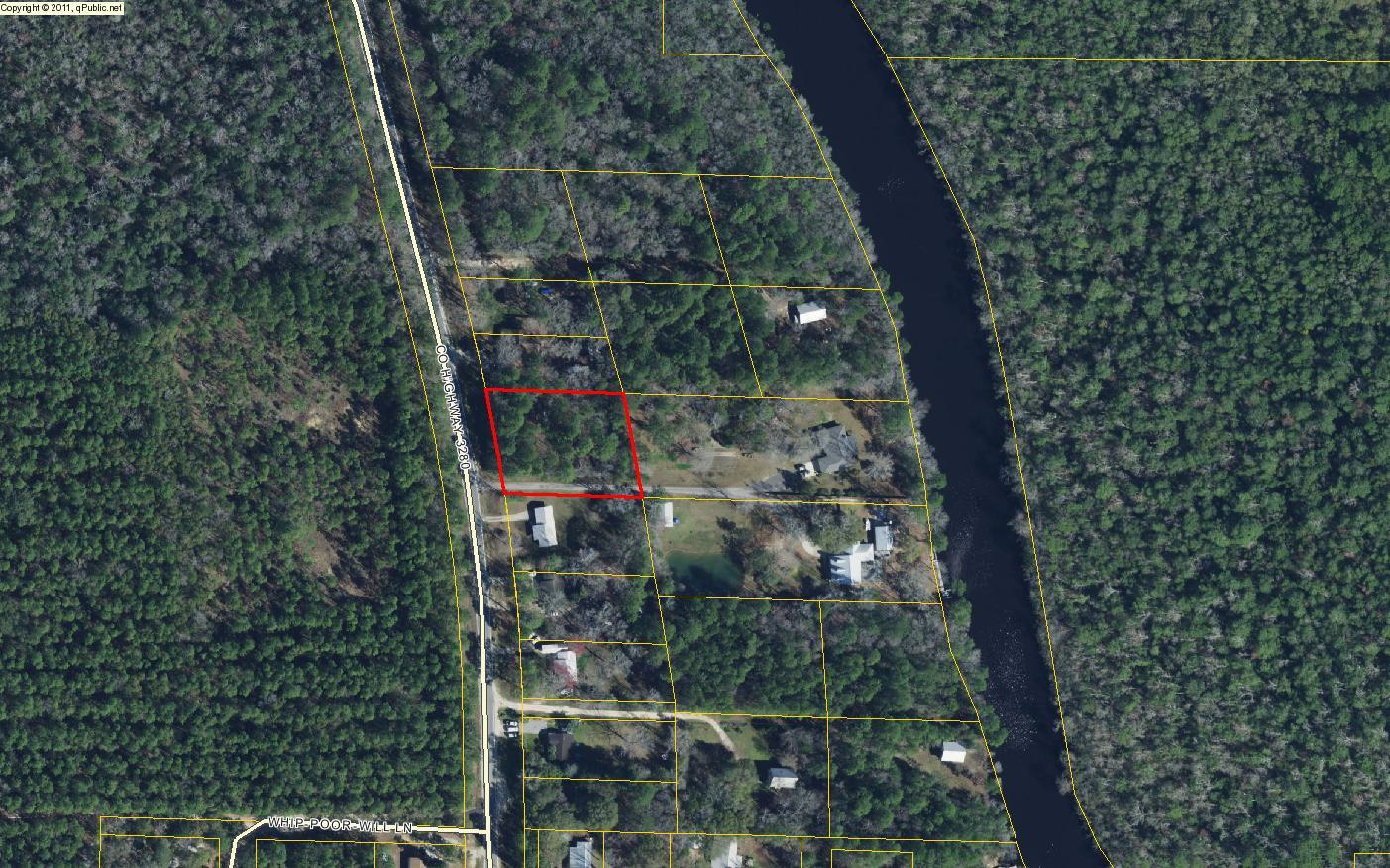 PRICE REDUCED!! Large lot .94 acre lot with 175Ft of road frontage on HWY 3280. Lot is only .2 mile from the public boat launch on Black Creek! From this boat launch you can travel down into the Choctawhatchee Bay within a matter of minutes. Have easy access to the bay without paying bay front lot prices. Spend all day on they bay then return to the boat launch only one minute from this lot.