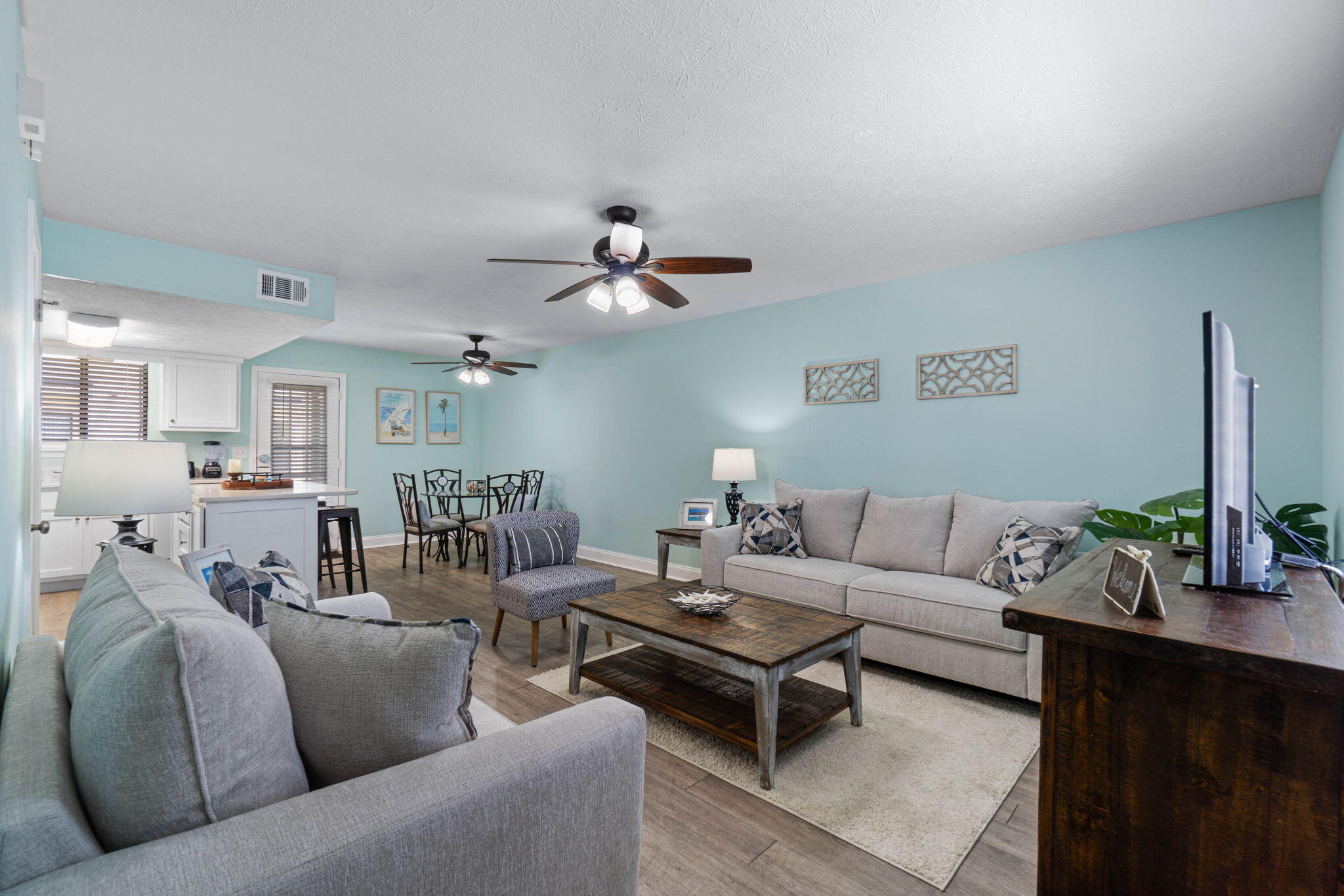 Under Contract, taking back up offers. Updated, fully furnished townhouse in the heart of Panama City Beach! A welcoming permanent residence, a rental-ready lucrative investment property or a charming beach getaway, this home offers many options. Located within walking distance of the BEACH, shopping, dining and several popular attractions. Spacious living area, open concept kitchen/dining room downstairs. Back patio with additional space for open-air dining. Two bedrooms upstairs, balcony access from the master bedroom. The gated community of Gulf Highlands Beach Resort features 11 swimming pools (5 heated), 4 tennis courts/ Pickleball, Fitness Center, 18 hole mini golf, 2 Playgrounds, Shuffleboard courts and private Beachfront Club House. Buyer to verify all information deemed importan