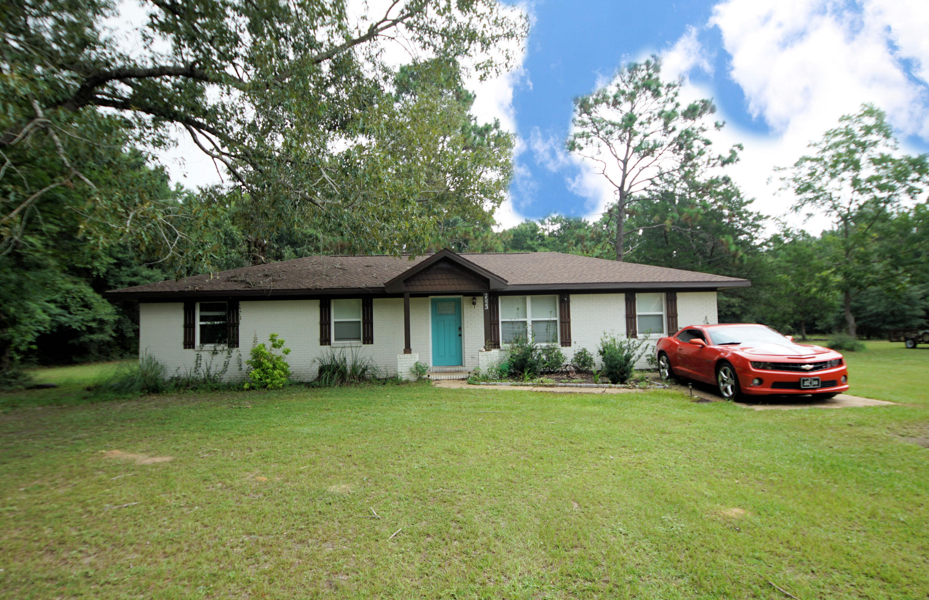 FOUR bedroom updated home on a full acre in North Crestview. The kitchen has white shaker style cabinets, granite counters and stainless appliances. Main areas have bamboo flooring and neutral paint colors. Master bedroom has an updated ensuite bathroom with separate tub and shower. The 3 additional bedrooms are on the opposite site of the home with the updated hall bath. The largest additional bedroom has an ensuite half bath. Outside there is a large deck with a portion of the yard fenced. There is a yard building for yard equipment. The rest of the acre is not fenced. Pets may be allowed with owner approval and a non refundable pet fee. NO smoking. All applicants 18 years or older must fill out an application at www.nicevillerental.com