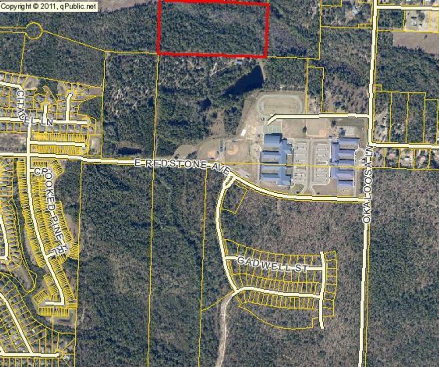 Wooded property on the south side of Crestview. There appears to be no access to this property but we are verifying.