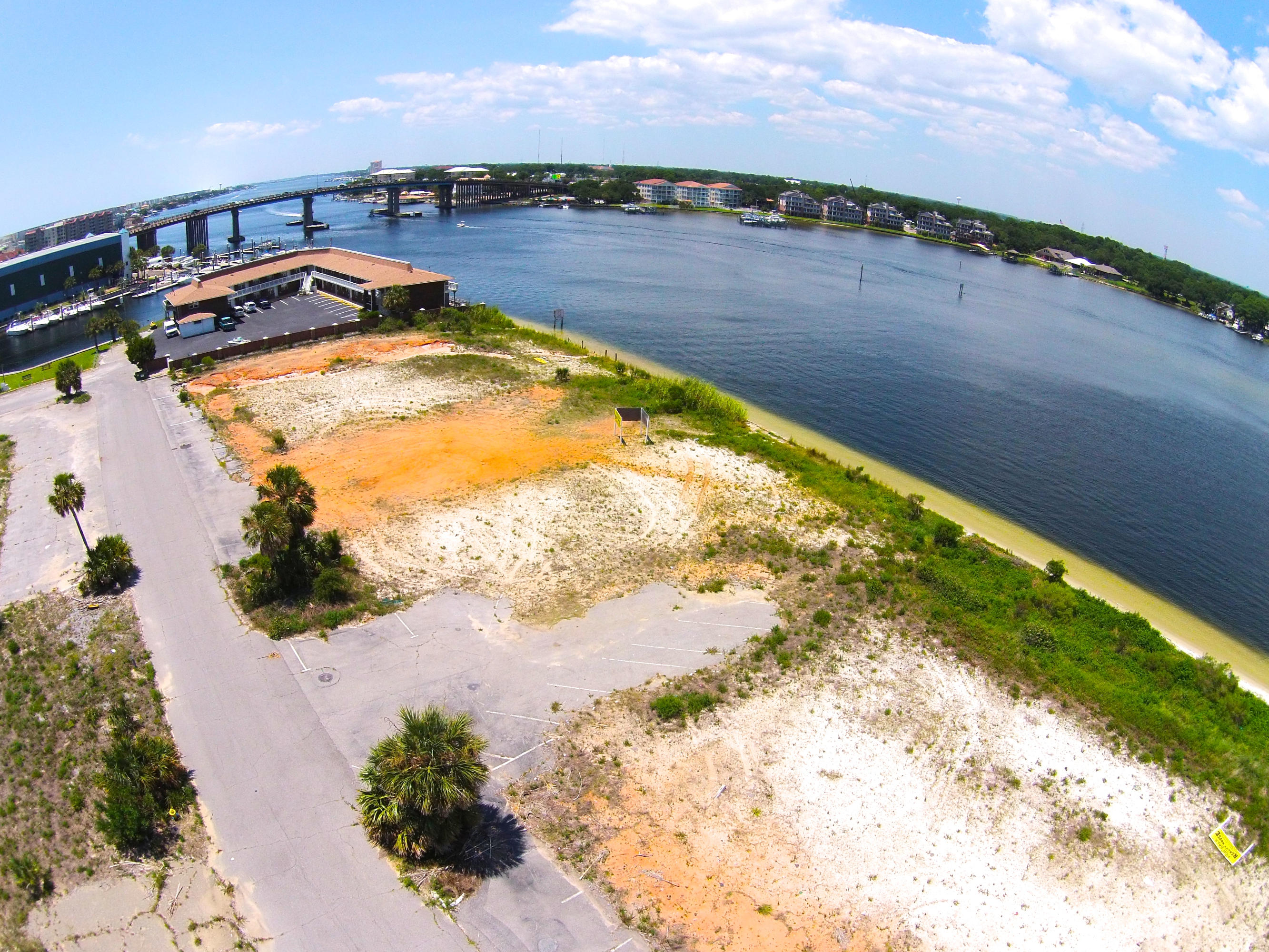 4.24 acres Zoned B-3, Light Commercial & Concession Areas, with 466 Ft of Waterfront the majority of which lies in an x Flood Zone. The property is comprised of a total of eight contiguous parcels, 1.74 acres+/- of waterfront land and 2.50 acres+/- of interior land. Located directly north of Legendary Marine and South of Marler Park, 5 miles West of Destin and 35 miles East of Pensacola, and lies on the south banks of Santa Rosa Sound. Perfect location for Recreational and Commercial Development Such as Restaurants, Bars, Shopping, and Tourism Activities.